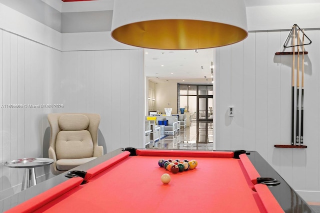 rec room featuring wooden walls and pool table