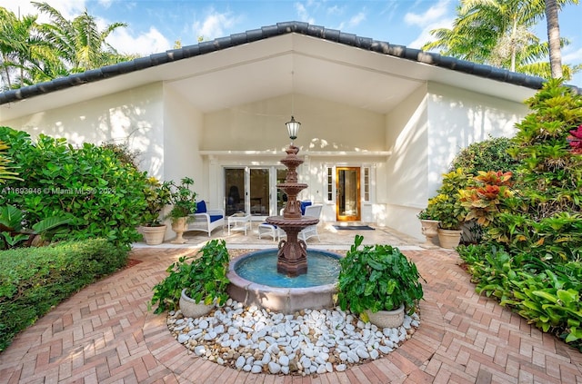 rear view of property with a patio area