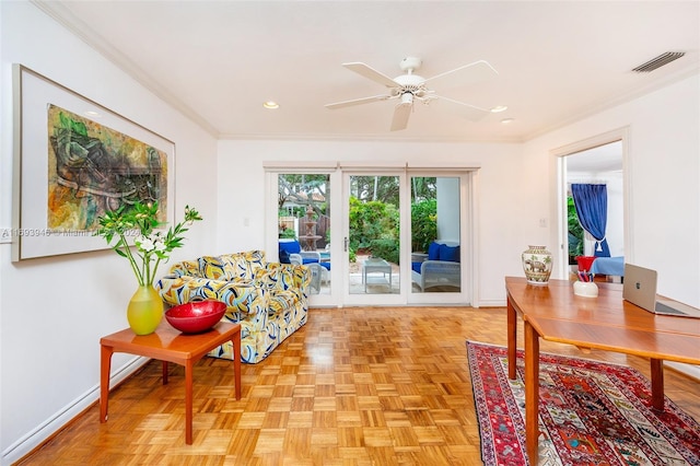 interior space featuring light parquet floors, ceiling fan, and crown molding