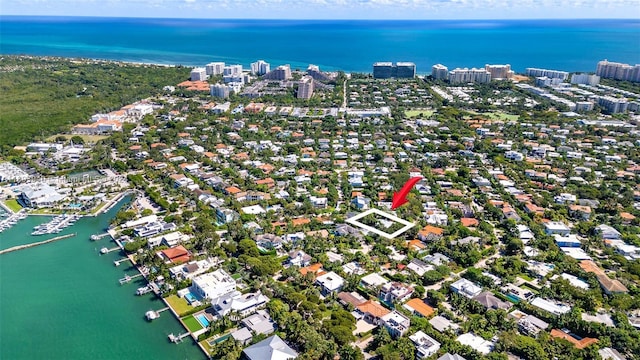 drone / aerial view with a water view