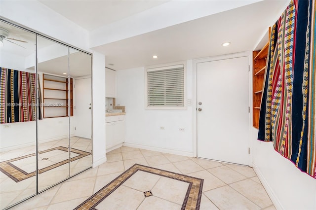 bathroom featuring tile patterned floors and ceiling fan