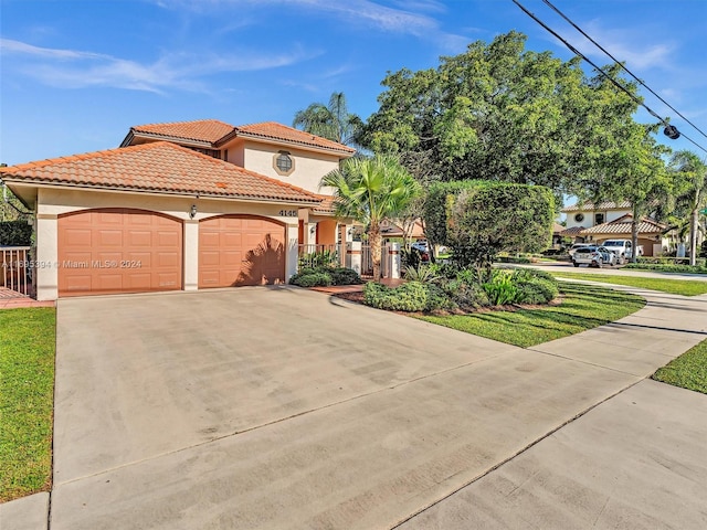 mediterranean / spanish-style home featuring a garage