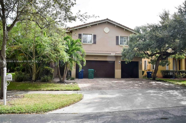 view of front of home featuring a garage