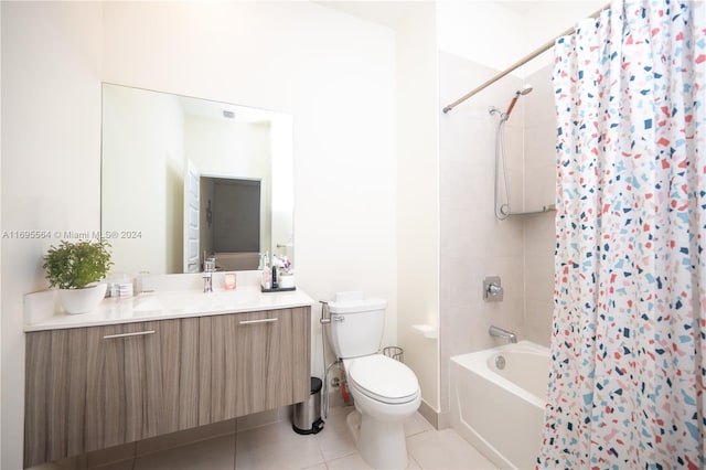 full bathroom featuring toilet, shower / tub combo, vanity, and tile patterned floors