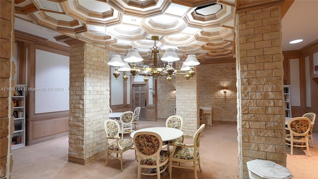 dining room featuring crown molding, light colored carpet, and a notable chandelier