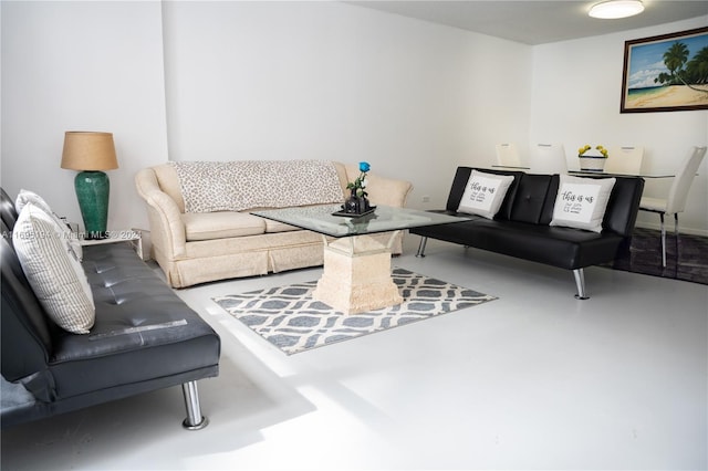 living room featuring concrete floors