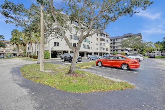 8010 Hampton Blvd Unit 211, North Lauderdale, FL 33068 - view of apartment building / complex with uncovered parking