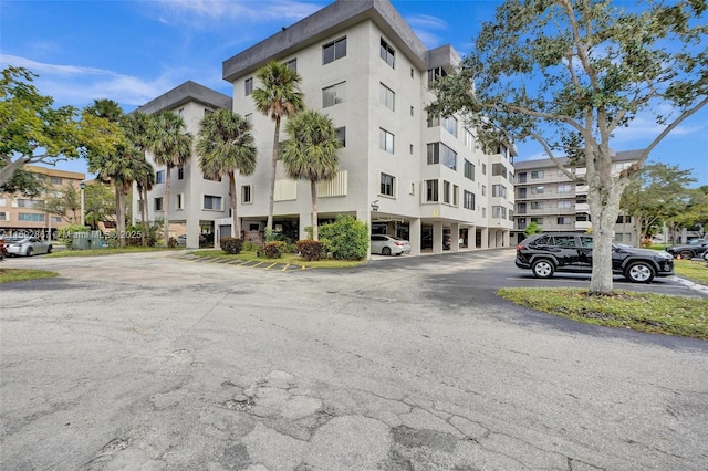 8010 Hampton Blvd Unit 211, North Lauderdale, FL 33068 - view of apartment building / complex with uncovered parking