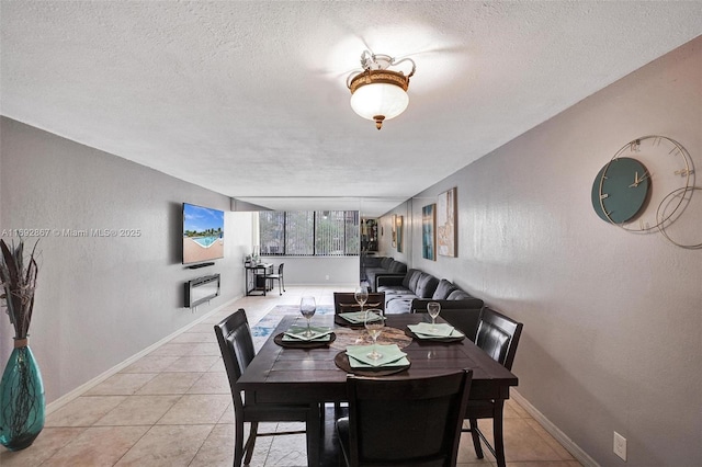 8010 Hampton Blvd Unit 211, North Lauderdale, FL 33068 - dining room with a textured ceiling and light tile patterned flooring