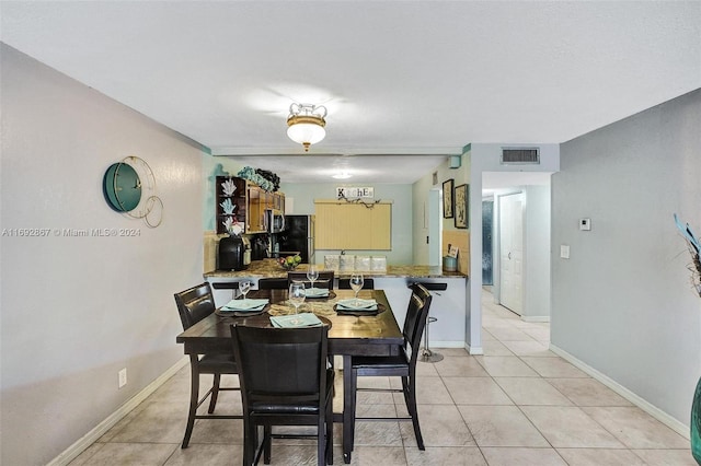 view of tiled dining room