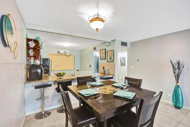 view of tiled dining room