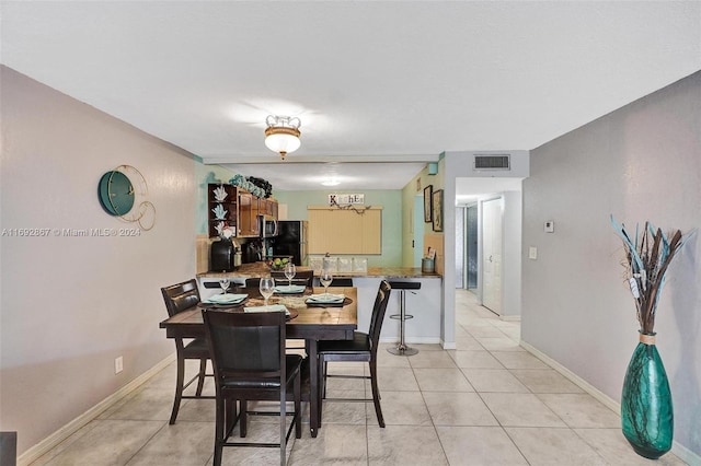 view of tiled dining area