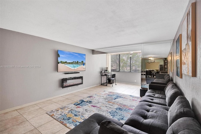 tiled living room featuring a textured ceiling