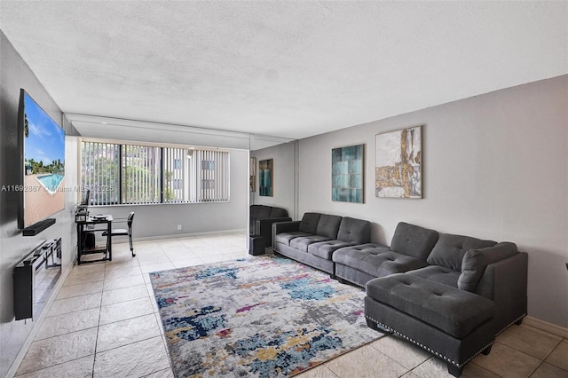 8010 Hampton Blvd Unit 211, North Lauderdale, FL 33068 - living room with light tile patterned floors and a textured ceiling