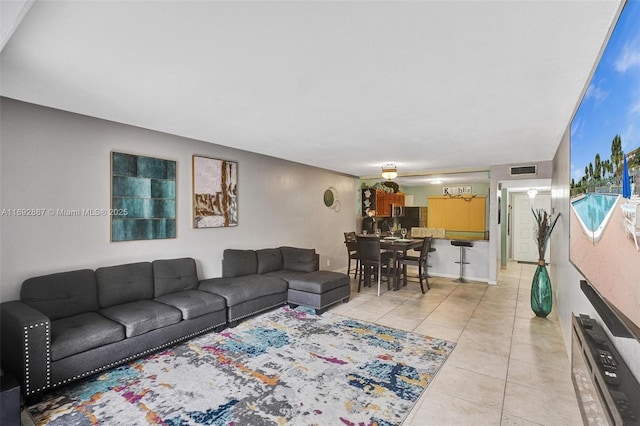 8010 Hampton Blvd Unit 211, North Lauderdale, FL 33068 - living area with light tile patterned flooring