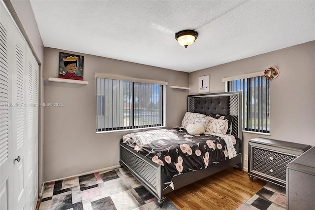 8010 Hampton Blvd Unit 211, North Lauderdale, FL 33068 - bedroom with a closet and a textured ceiling