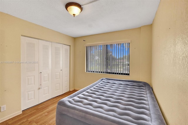 8010 Hampton Blvd Unit 211, North Lauderdale, FL 33068 - bedroom with wood finished floors and a closet