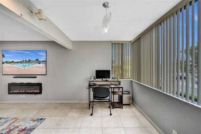 tiled home office with beamed ceiling