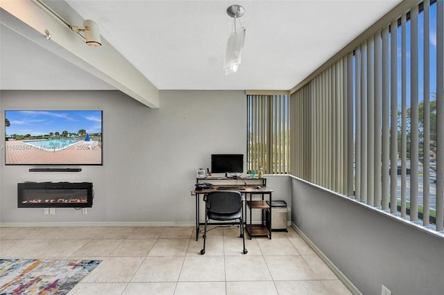 8010 Hampton Blvd Unit 211, North Lauderdale, FL 33068 - tiled home office featuring baseboards