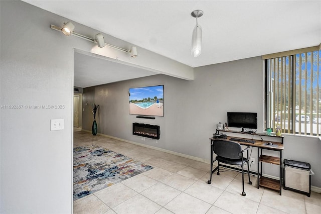 8010 Hampton Blvd Unit 211, North Lauderdale, FL 33068 - tiled home office with a glass covered fireplace and baseboards