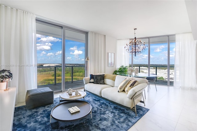 living room featuring plenty of natural light, expansive windows, and a chandelier