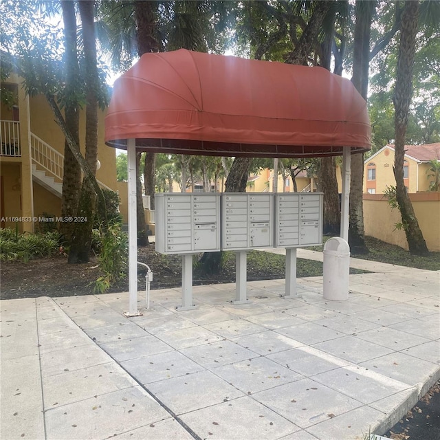 view of home's community with a mail area