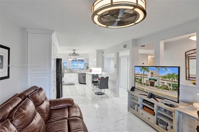 living room featuring ceiling fan