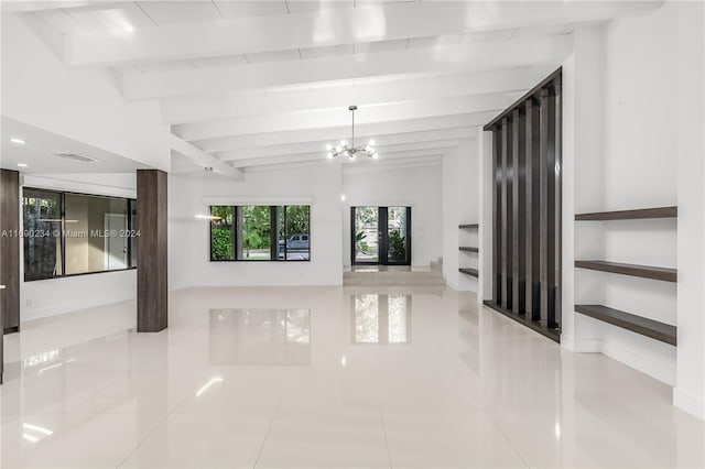 unfurnished living room featuring a chandelier, french doors, light tile patterned flooring, and lofted ceiling with beams