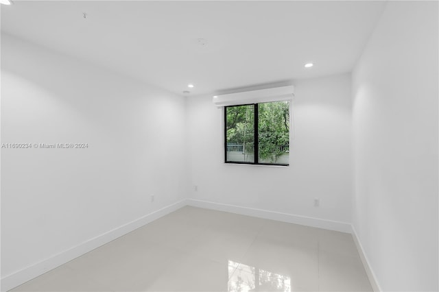 view of tiled spare room