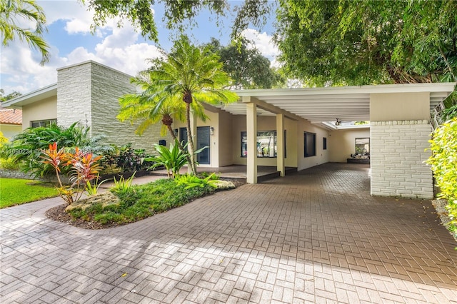 view of front of house featuring a carport