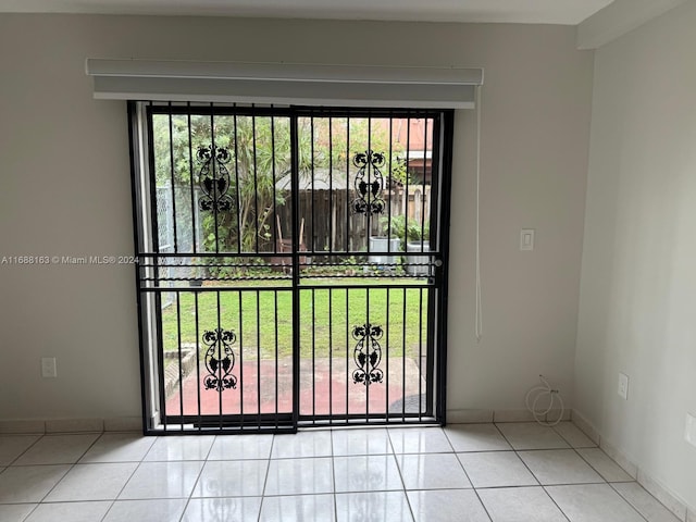 entryway featuring light tile patterned floors