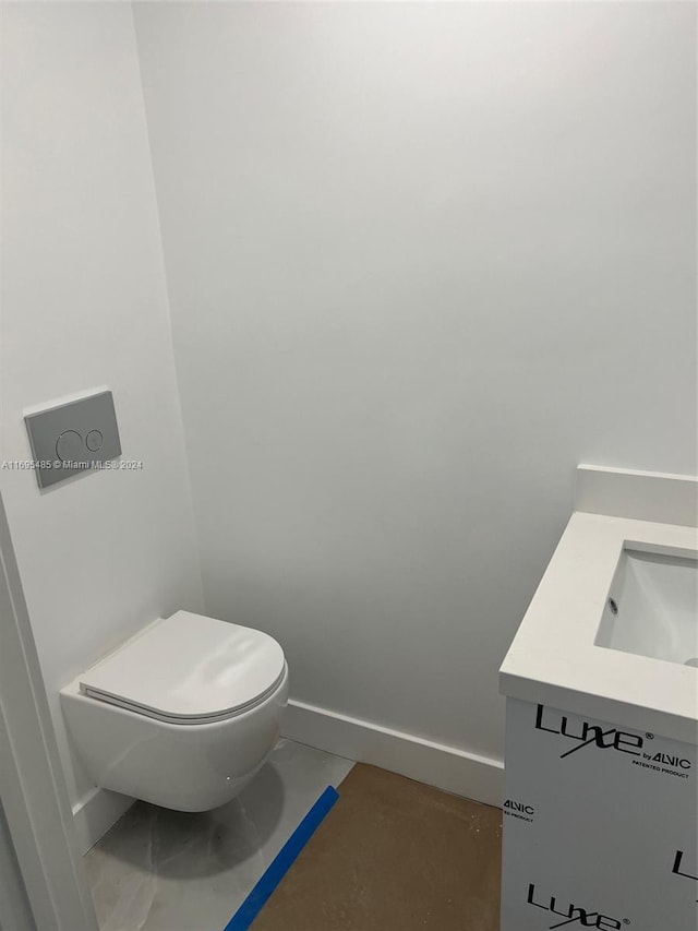 bathroom with toilet and sink