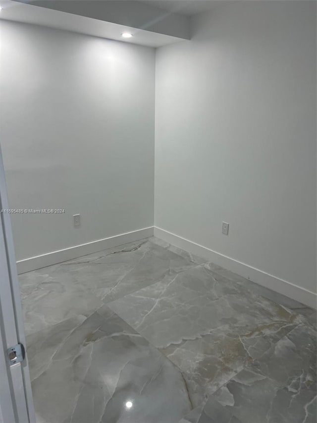 9801 Collins Ave Unit 15P-, Newly Renovated, Bal Harbour, FL 33154 - empty room featuring marble finish floors and recessed lighting