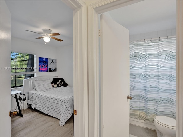 bedroom featuring light wood-type flooring and ceiling fan