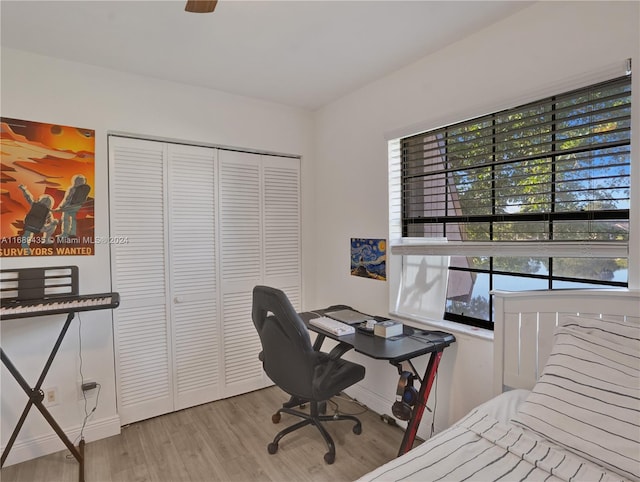 office with light wood-type flooring