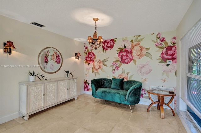 living area with a chandelier