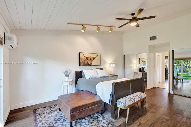 bedroom featuring a wall mounted air conditioner, wood ceiling, vaulted ceiling, ceiling fan, and dark hardwood / wood-style floors