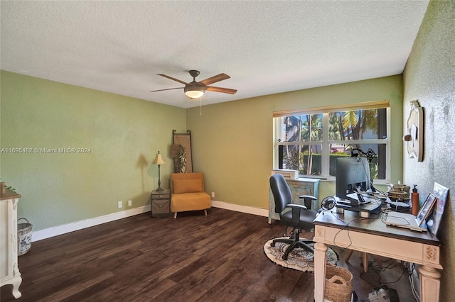 home office featuring ceiling fan, dark hardwood / wood-style flooring, and a textured ceiling