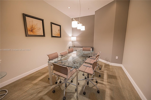 dining space featuring carpet flooring