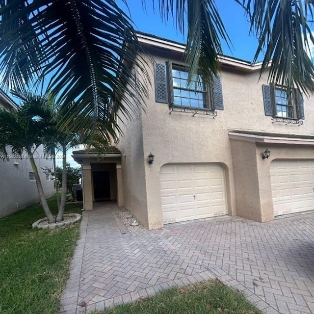 exterior space with a garage