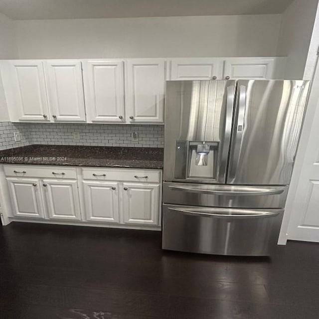 kitchen with decorative backsplash, stainless steel fridge with ice dispenser, white cabinetry, and dark wood-type flooring