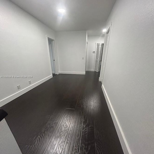 hall featuring dark hardwood / wood-style flooring