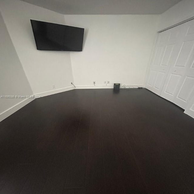 spare room featuring hardwood / wood-style flooring