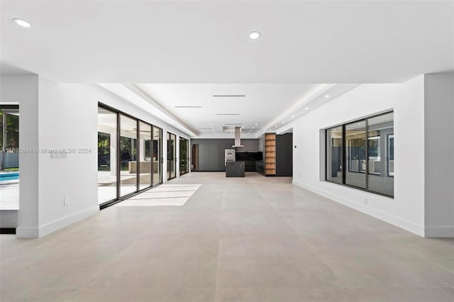 corridor with concrete flooring