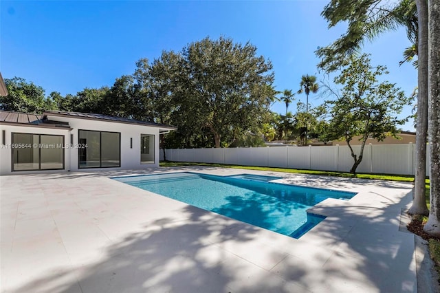 view of pool with a patio