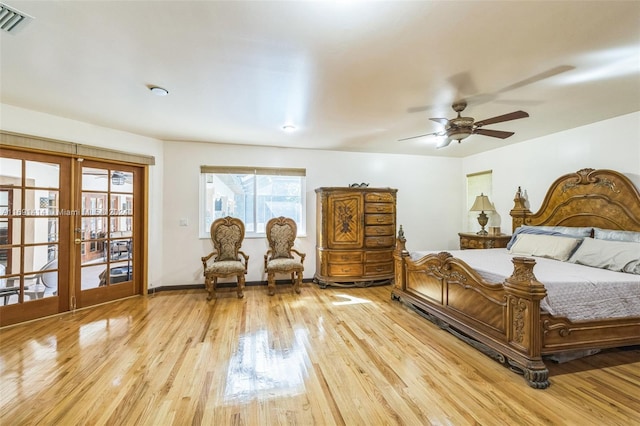 bedroom with access to outside, ceiling fan, french doors, and light hardwood / wood-style floors