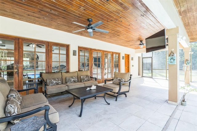 exterior space with outdoor lounge area and french doors