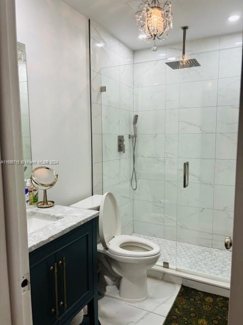 bathroom with vanity, toilet, and walk in shower