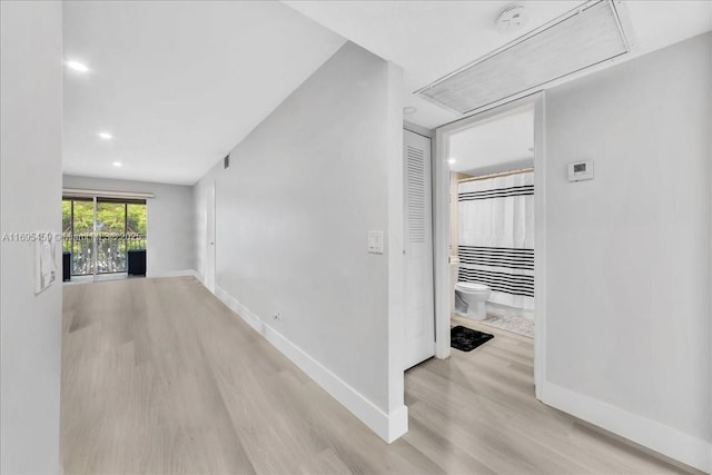 hall featuring light wood-type flooring