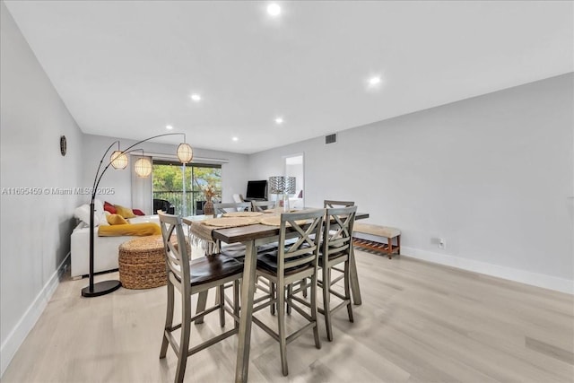 dining area featuring light hardwood / wood-style flooring